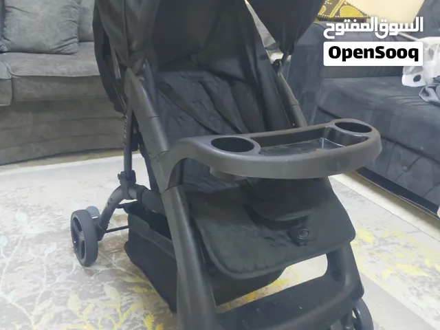 عربة اطفال شبه جديده