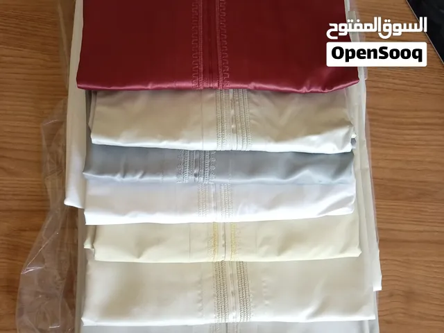 دشاديش عمانية باقمشة يابانية اصليه شبه جديده سعر الدشداشه الأصلي يتراوح بين 15 إلى 20 رع