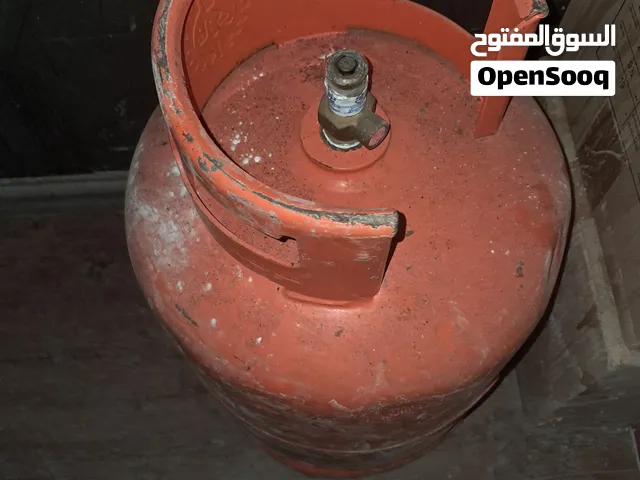 انبوبة غاز مع منظم وخرطوم