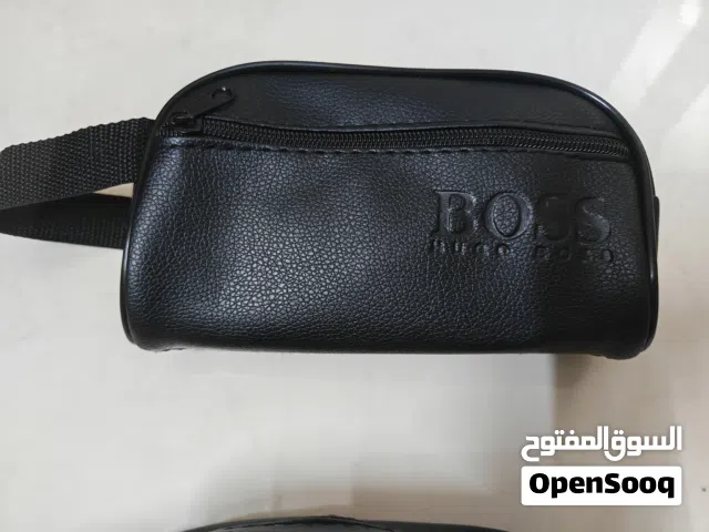 شنط جلد يدوية للهاتف والمحفظه والمفاتيح