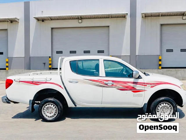 2015 Mitsubishi L200 Double Cabin 4x4 – Only 10,500 KM! GCC – AED 20,000