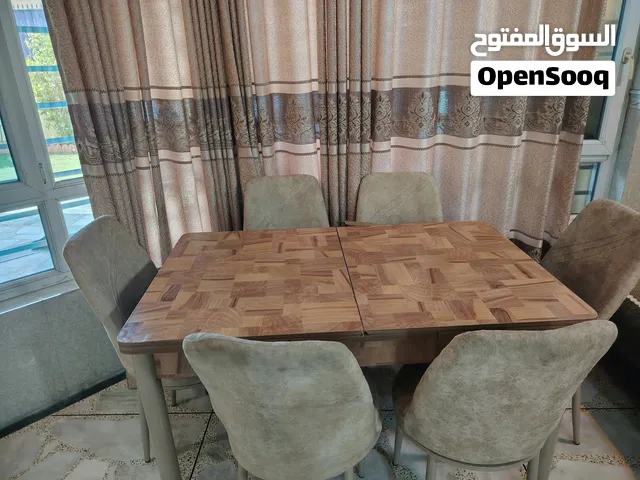 ميز طعام 6 كراسي يتكبر ويتصغر