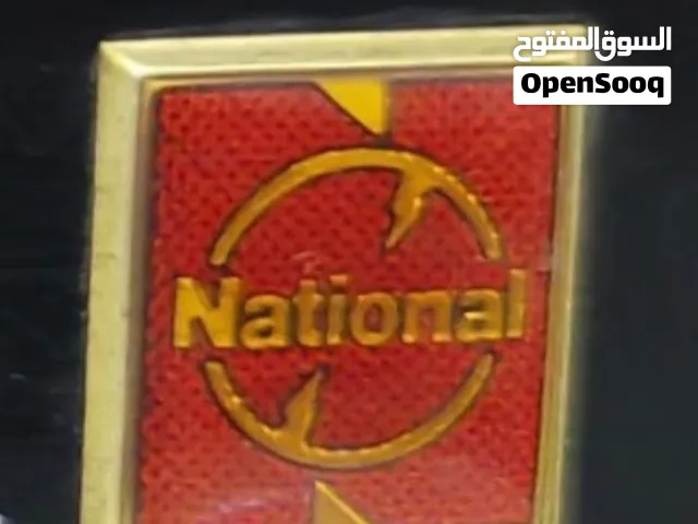 للبيع تلفزيون انتيك فنتج ناشيونال مخشب ملون مع الريموت