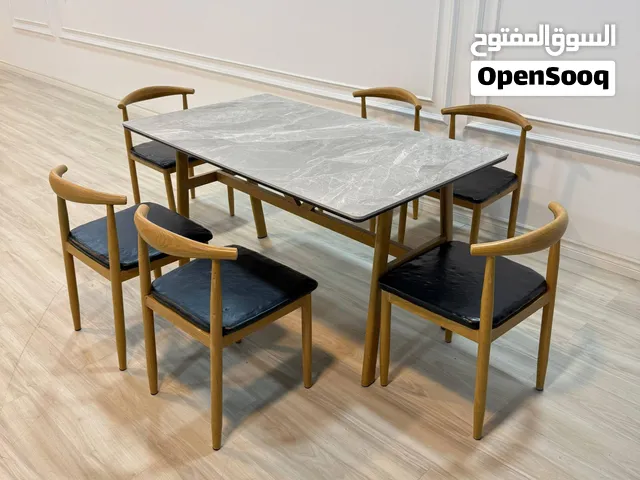 ميز طعام كرسي رجل حديد سطح مرمر صناعي هيكل حديد صبغ حراري
