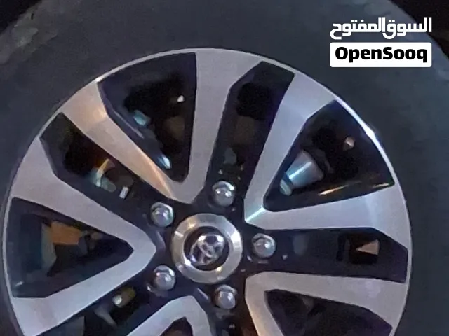 خمسة جنوط تورنق مقاس 20 وكاله مع كفرات دانلوب نصف استعمال