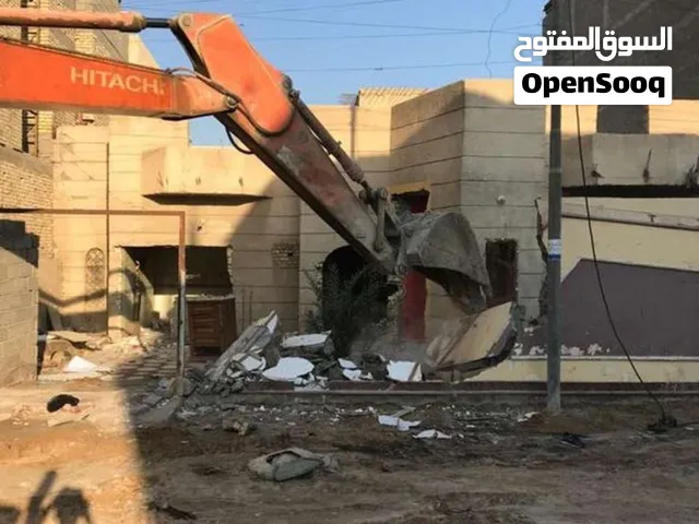 تفليش وهدم ونقل الانقاض وقلع القطع ودفنها بالأسمنت والجلمود والأسمنت وحدلها طبقتين او ثلاث طبقات