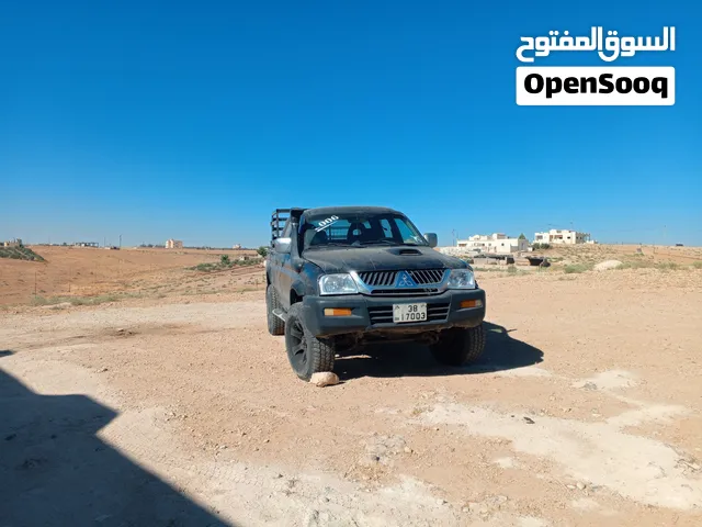 بكم ميتسوبيشي 2006 دفع رباعي قابل للبدل مرخص سنه. اقرا الةصف