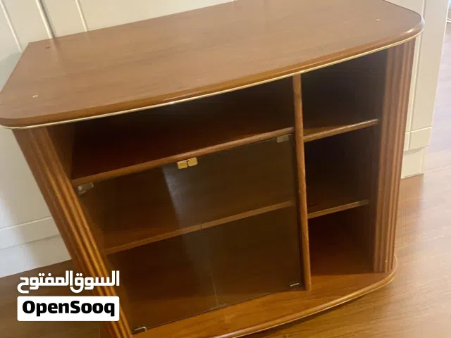 TV stand in wood and glass Like new · Brown and Transparent · Glass and Wood
