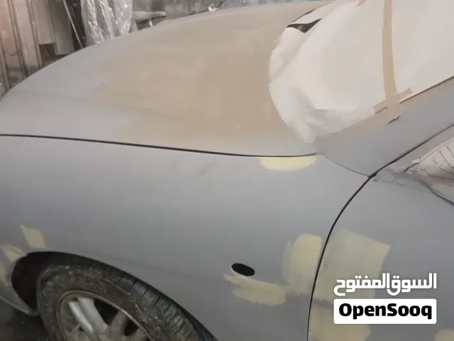 سيارة دايو نوبيرا 1999 ذهبي