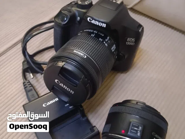 canon 1300d with two lenses