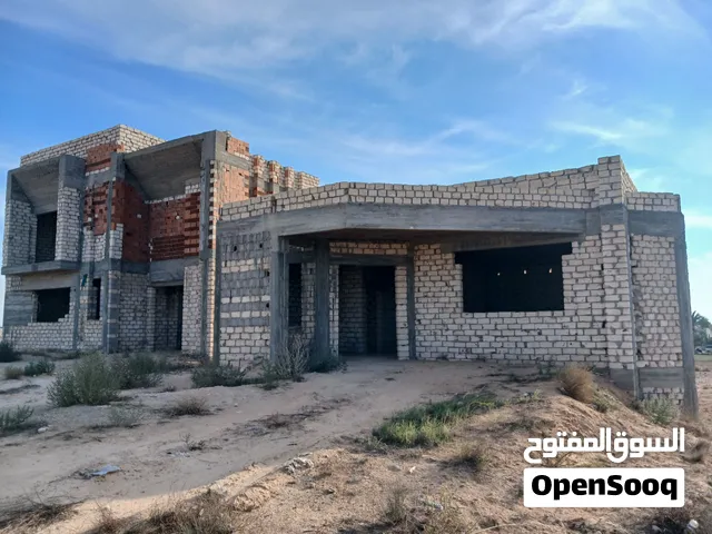 قطعة ارض ومنزل هيكل للبيع بصبراتة  أرض 2000م2  مسقوف 630م2  5 غرف  موقع مرتفع ومميز
