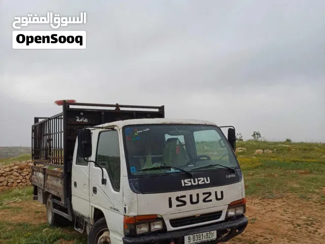 اسوزو NPR مديل 1999 محرك 3900 ديزل  للبيع او البدل وفي مجال بسعر  موجوده بلخليل دورا قريه الصرة