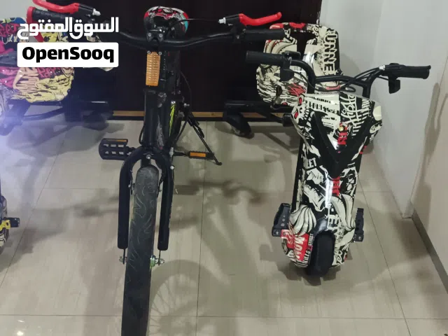 سكوترين كهربا و سيكل واحد مع جارج