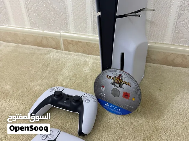 Ps5 slim disc and 2 controllers and god of war 3 remastered used like new with bag
