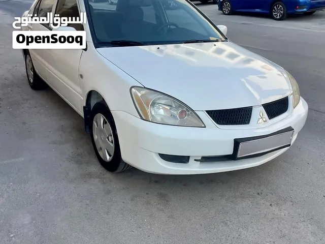 Mitsubishi Lancer 2009 for sale Car is good condition AC 100% OK Gear 100 % ok Engine 100% ok