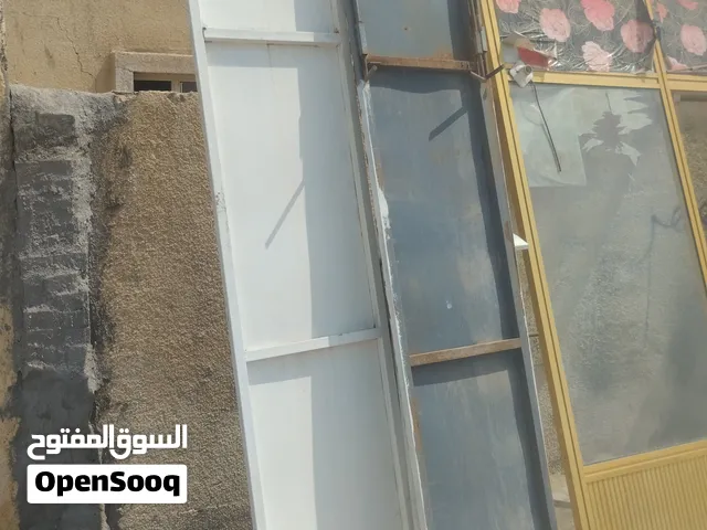 وباب حديد دفتري ويا شيلمانه مالته عرض 3مترات 60  ارتفاع 3مترار 40