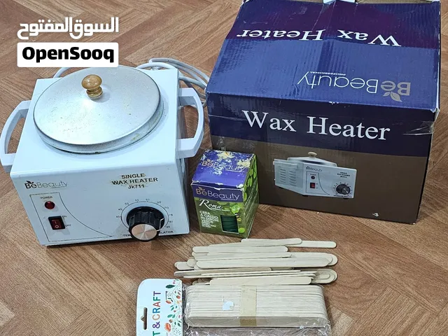 جهاز واكس مع الشمع
