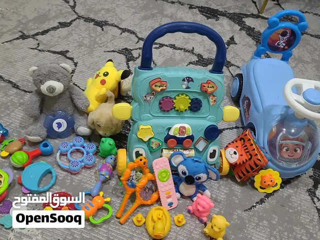 العاب اطفال وحقيبة وحمالة