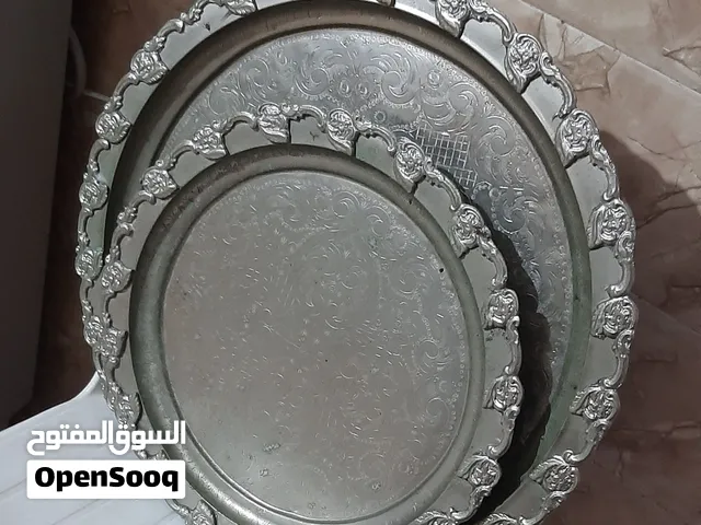 تحف قديمة من الفضة و الطاووس الحر