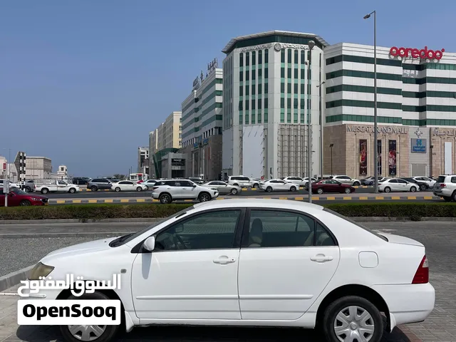 تويوتا كورولا 2006 XLI ابيض داخل بيج بهوان