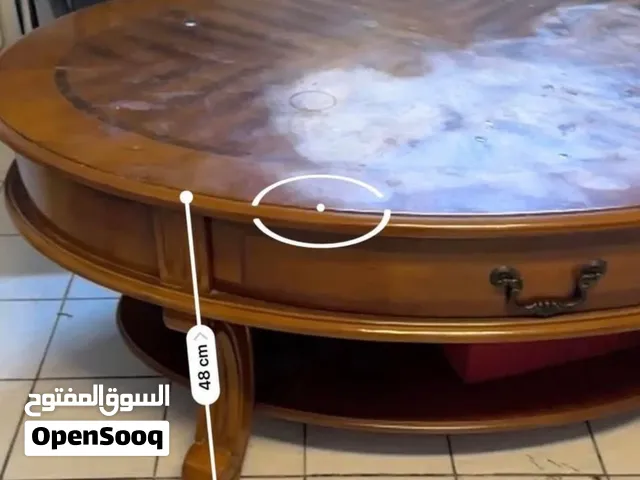 Wooden table with drawer