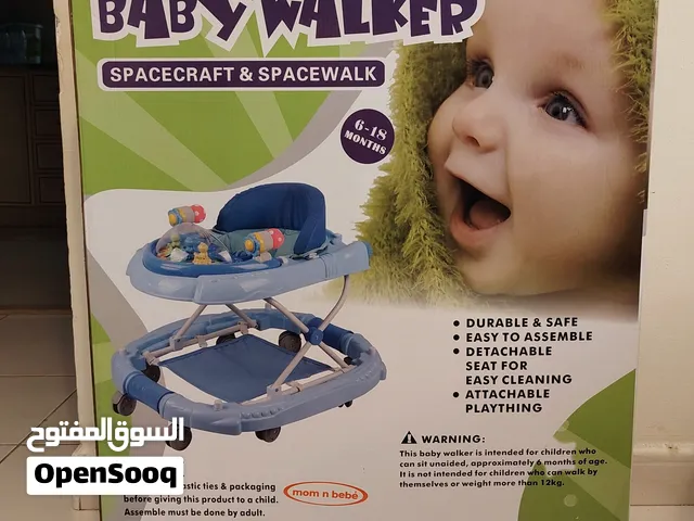 مشاية للاطفال لون وردي جديد غير مستعمل mom n bebé Walker pink color New not Used