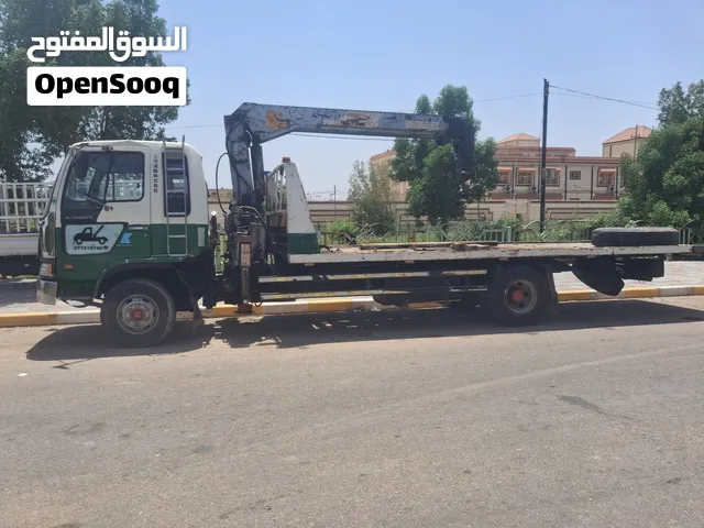 كرين سطحه لنقل السيارات والمعدات الثقيله