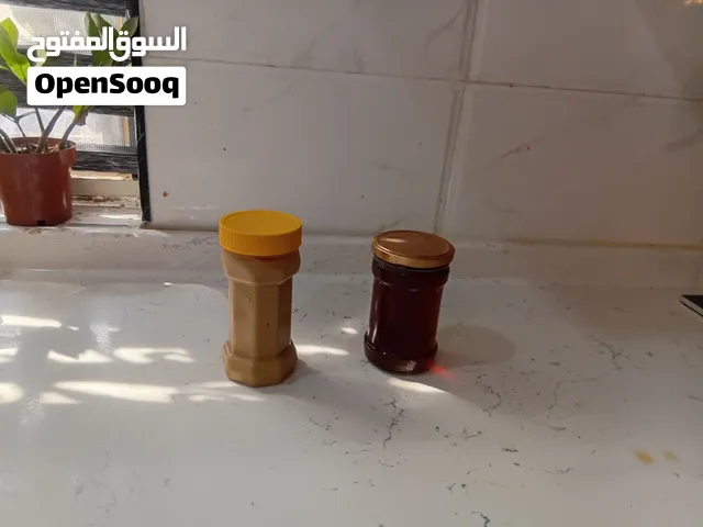 عسل وراشي وزيت زيتون طبيعي
