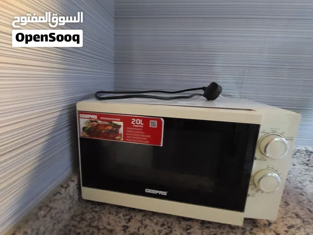 a month used geepas microwave.   .                                 .