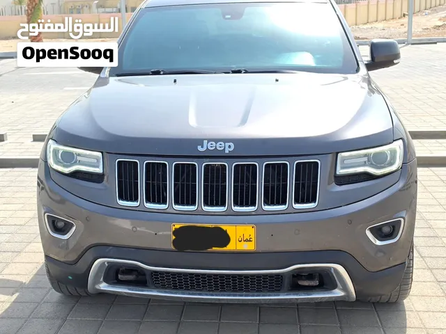 جيب جراند شروكي خليجي وكالة عمان رقم واحد لمتد جميع الكماليات سقف بانوراما زجاجي كراسي جلد