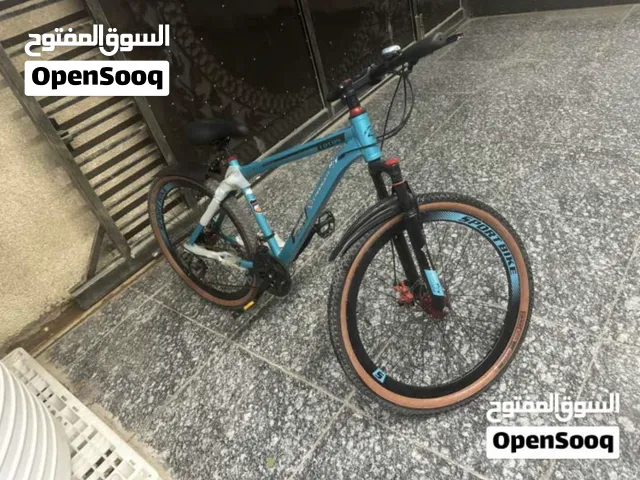 بايسكل رياضي جبلي جديد يحتوي ازرار تحكم بالدبلات حجم 24 نوعيه الحديد مايزنجر مع قفل للبايسكل