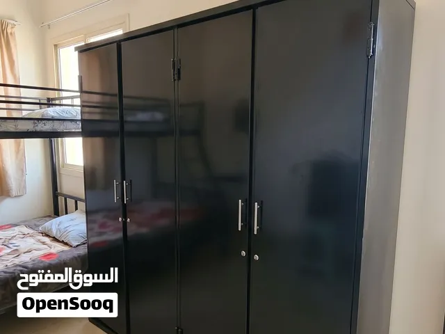 FOR SALE: Heavy-Duty Custom Iron Wardrobe