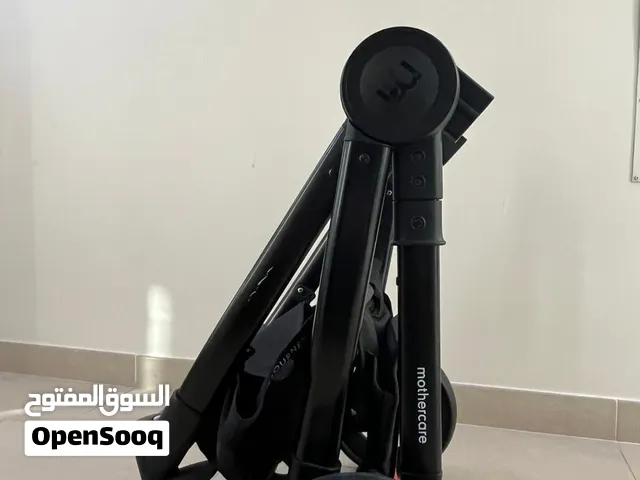 ترولي و كرسي سيارة للأطفال