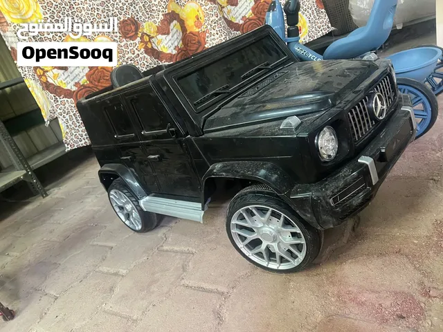 سيارة أطفال شبه جديدة معها 2 شاحن