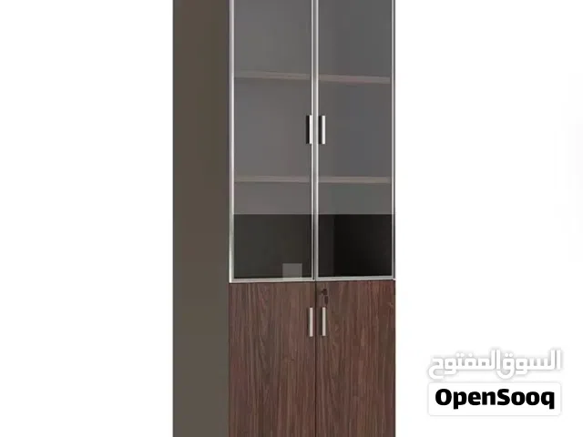 This is a modern wooden office filing cabinet with glass doors and locking compartments