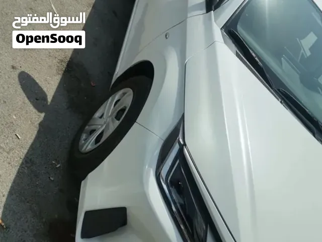 Yaris s/d 1.5 Prime with new car player and front/ reverse camera, primer glass tinted