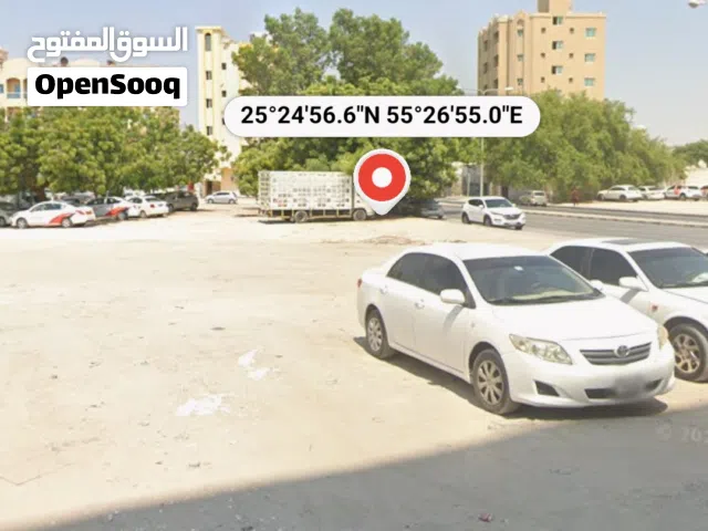 ارض على شارع رئيسي للبيع في البستان عجمان land for sale in al bustan on main road