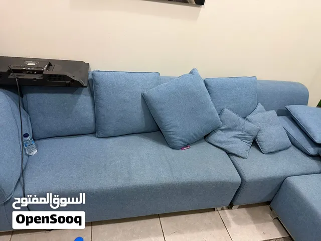 للبيع كنب ازرق مكون من ثلث قطع