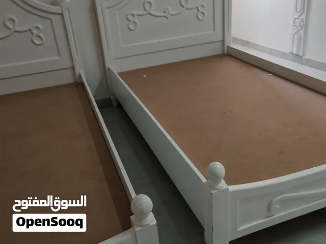 سريرين خشب تفصيل للبيع