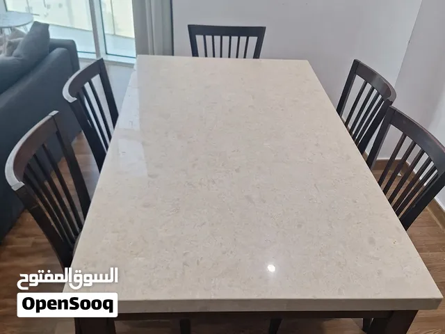 سفرة 6 كراسي رخام بارجل خشبية مستعملة