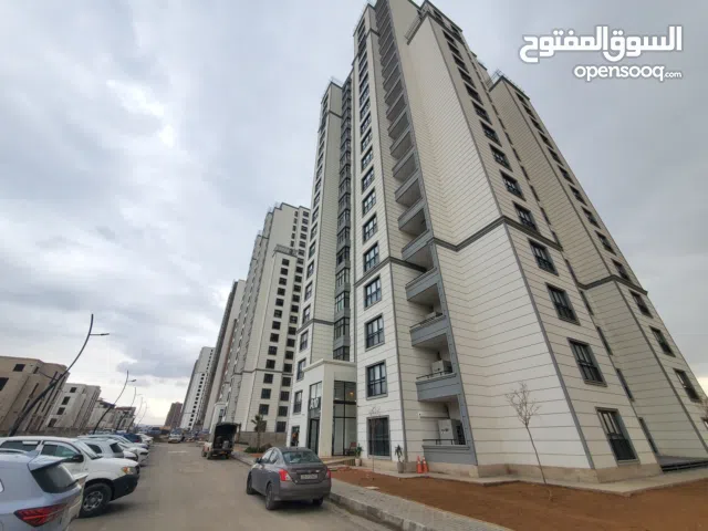 شقه بمجمع فلوريا نيركز تاور للبيع بالاقساط