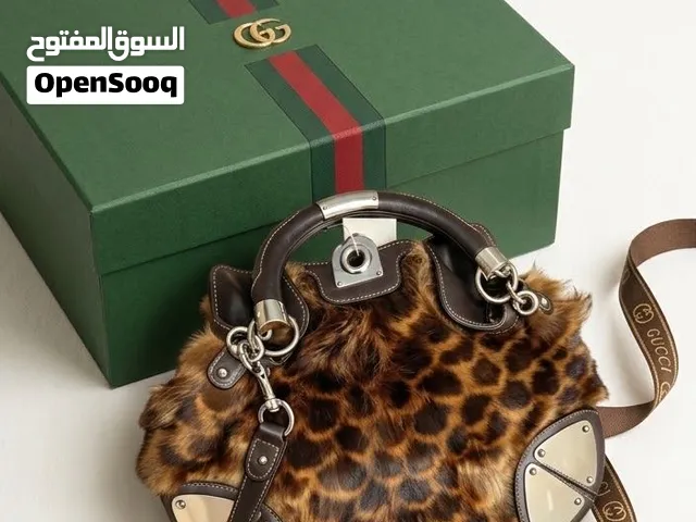brown Gucci for sale  in Doha