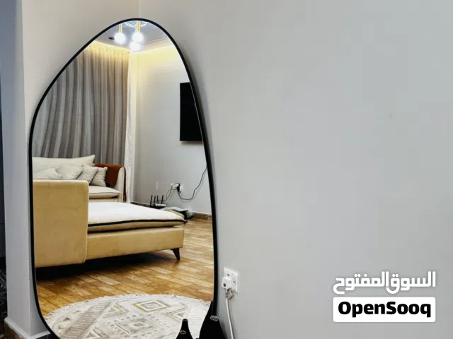 مرايا مع قاعده خشب