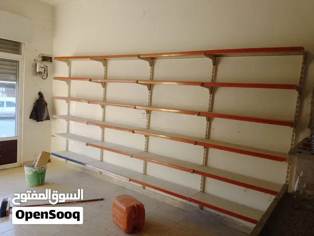 ثلاجه عرض +رفوف حديد بحاله ممتازه