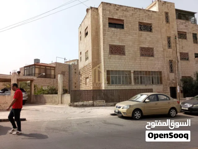 عمارة استثمارية في موقع مميز على شارعين تصلح للإستثمار في أرقى مناطق جبل الحسين / ref 9794