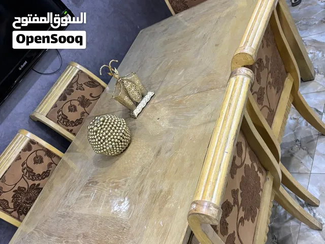 طاولت سفرة كبيره وكويسه للبيع الخشب نضيف اقرء الوصف