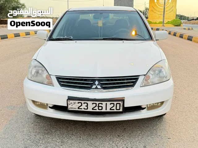 ميتسوبيشي لانسر للبيع موديل 2014 فل كامل الفحص 2جيد 2 ضربة على الرأس سعر مناسب جدا