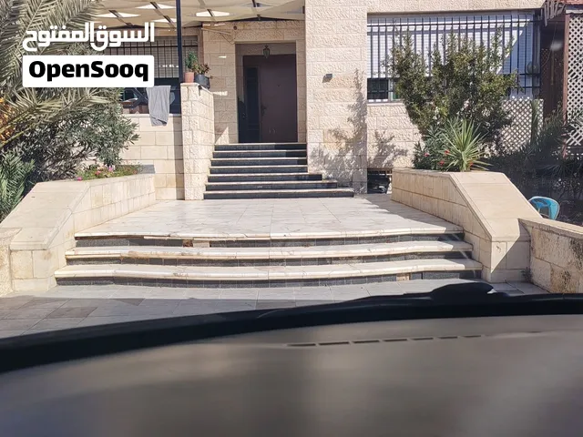 بيت طابق ارضي خط تحاري