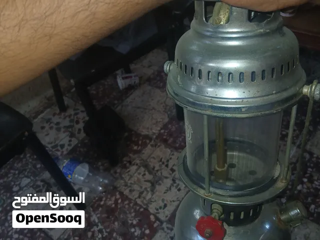 ساعه اصليه ولوكس قديم اصلي وقرن قديم منحس من تحت ومشغل موسيقة قديم