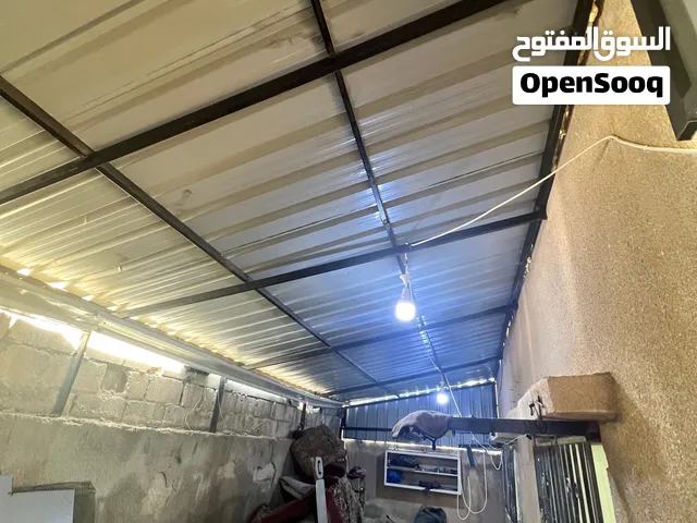 الواح زينكو وقضبان حديد وباب صاج تفصيل وبوابة حديد